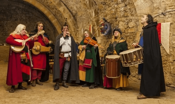 A group of people dressed in medieval costumes.